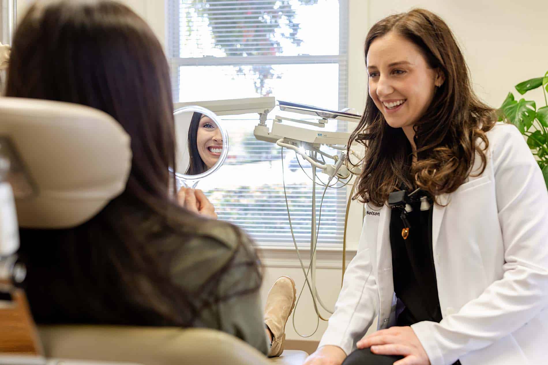 Dr. Nelson consulting with a dental patient in Brentwood TN