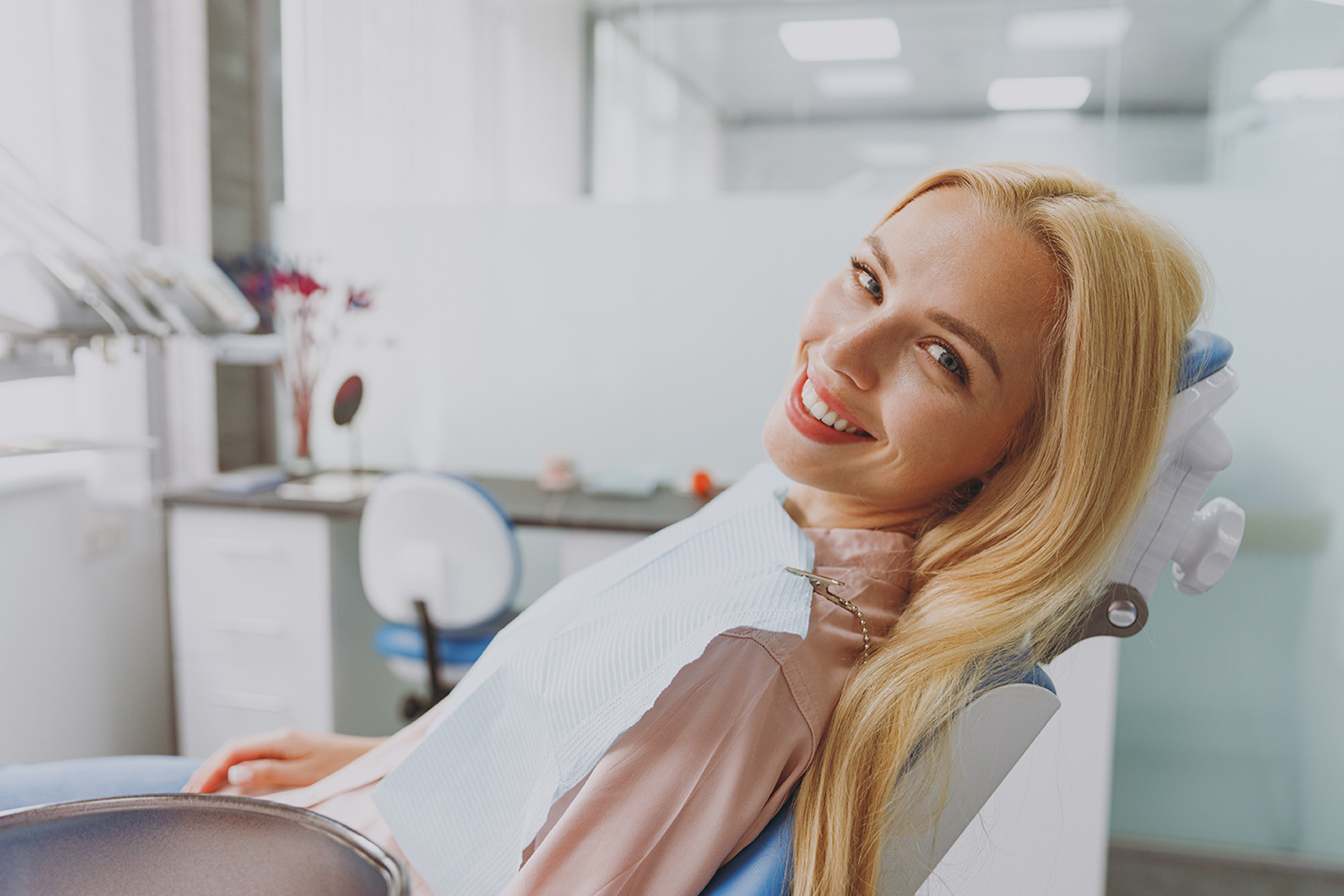 Woman after getting a comprehensive dental cleaning in Brentwood, TN