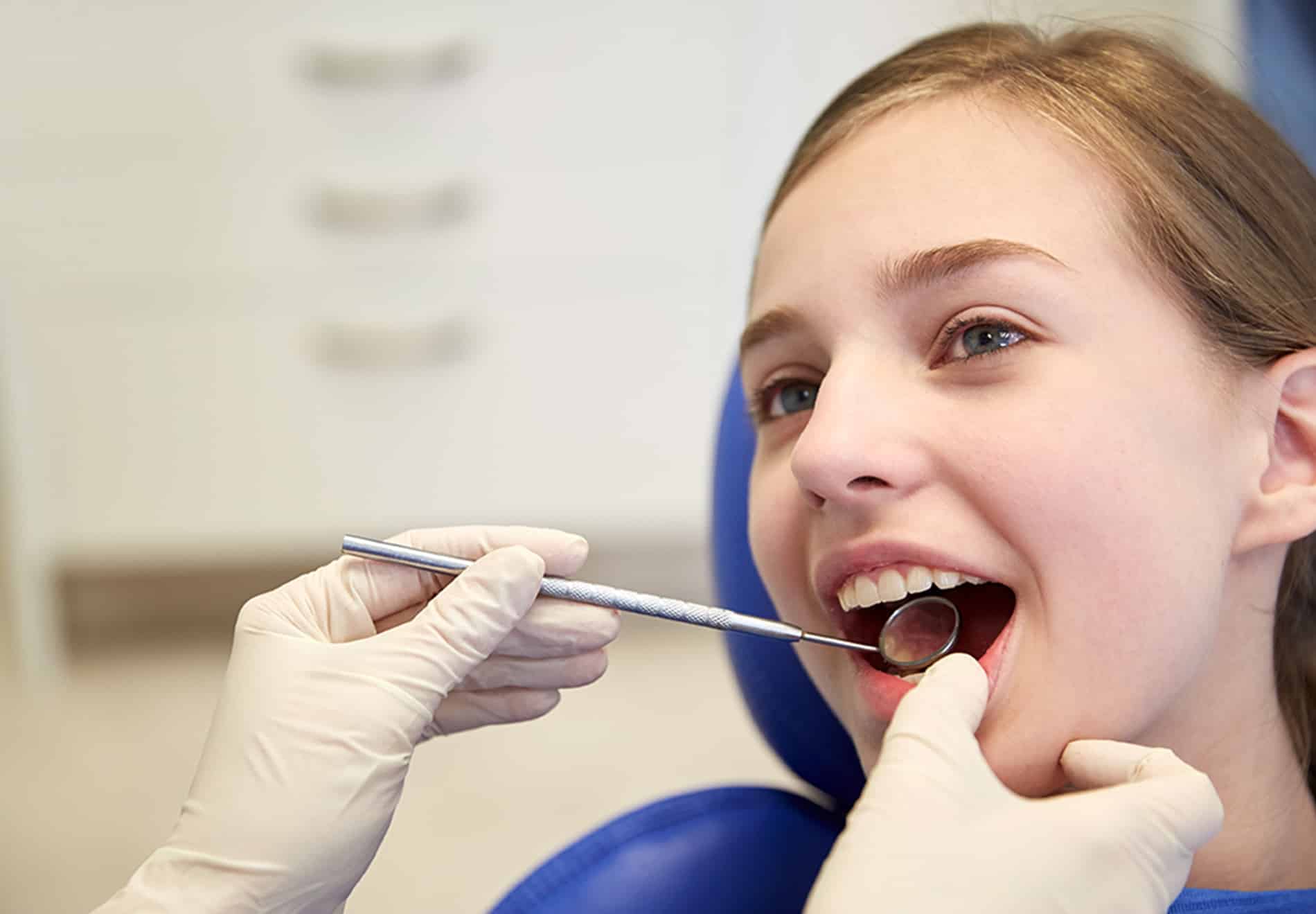 Girl getting a comprehensive dental exam in Brentwood, TN