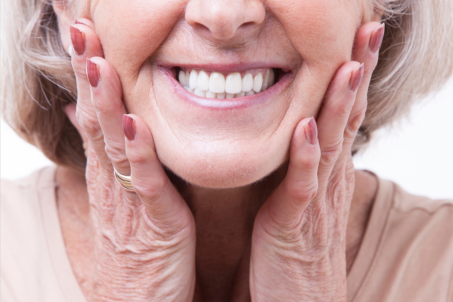 Woman smiling with complete dentures in Brentwood, TN