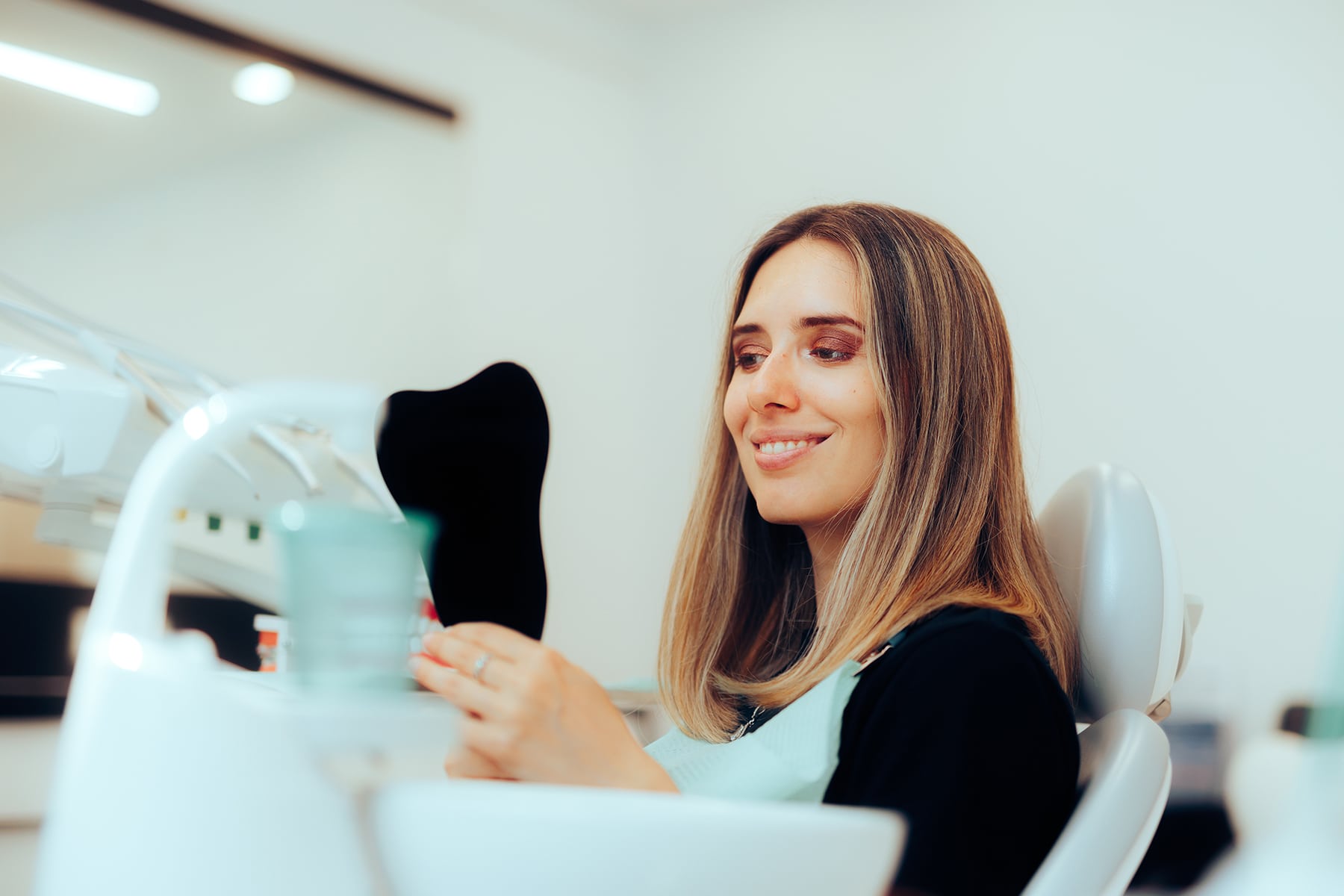 Woman getting a deep dental cleaning in Brentwood, TN