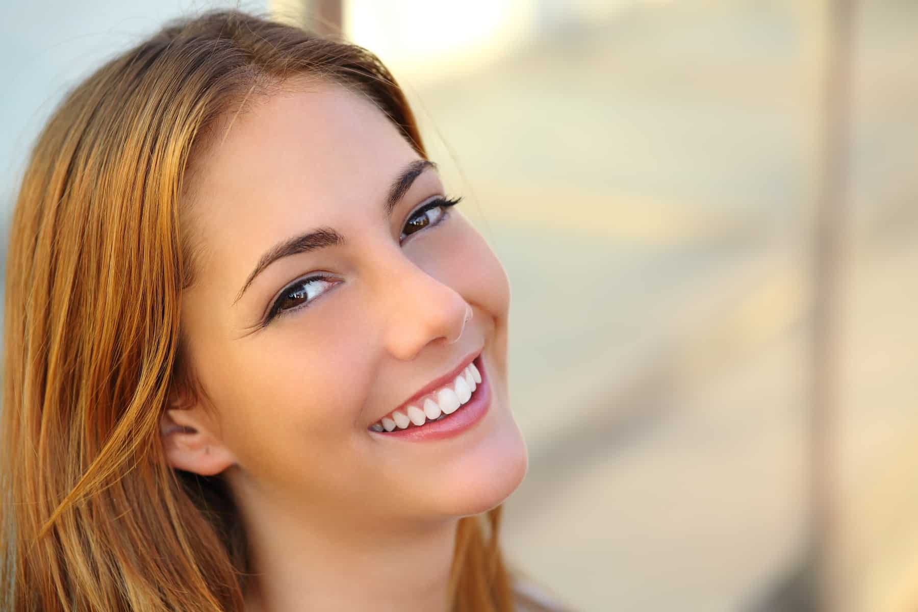 Patient maintaining her cosmetic dentistry results with advice from Brentwood Dental Center in Brentwood TN