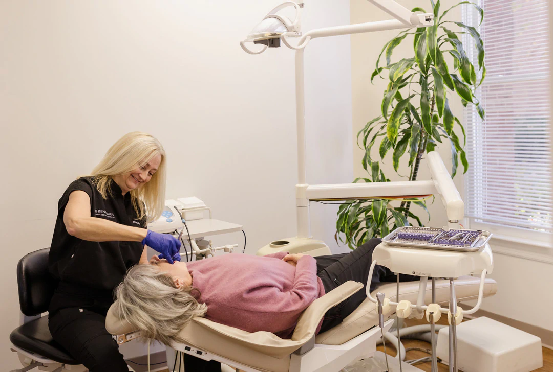 Girl getting a comprehensive dental exam in Brentwood, TN